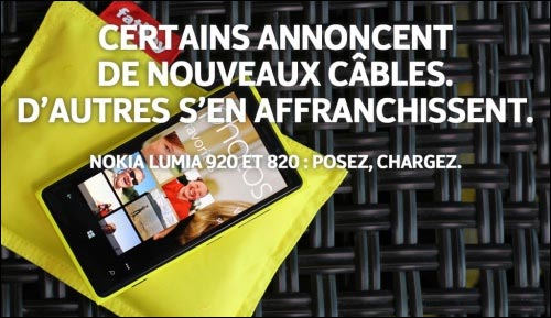 publicite comparative moquerie Nokia Lumia vs Apple iPhone 5 recharge sans fil